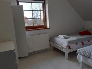 Łóżko lub łóżka w pokoju w obiekcie Agroturystyka Aura