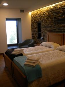 Un pat sau paturi într-o cameră la Casa de Aldea Araceli