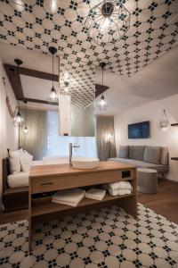 TV a/nebo společenská místnost v ubytování Hotel Tofana