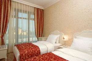 Кровать или кровати в номере The And Hotel Sultanahmet- Special Category