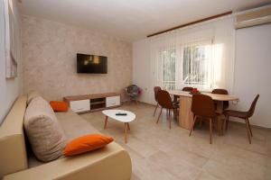 Телевизор и/или развлекательный центр в Apartment Ajdukovic