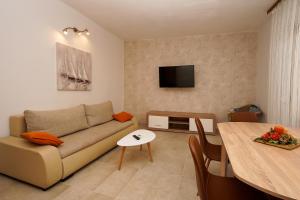 Телевизор и/или развлекательный центр в Apartment Ajdukovic