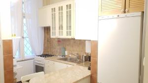 Kuchyňa alebo kuchynka v ubytovaní BMG Apartment Basilica + 37 fotografií