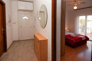 Кровать или кровати в номере Apartment Ajdukovic