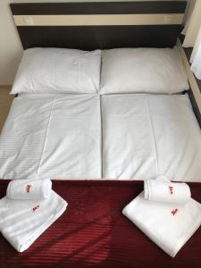 Posteľ alebo postele v izbe v ubytovaní Apartmán Eden