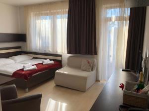 Posteľ alebo postele v izbe v ubytovaní Apartmán Eden