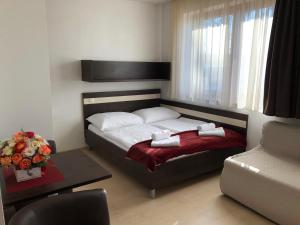 Posteľ alebo postele v izbe v ubytovaní Apartmán Eden + 34 fotografií