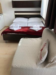 Posteľ alebo postele v izbe v ubytovaní Apartmán Eden