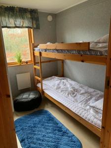 Krevet ili kreveti na sprat u jedinici u okviru objekta Sigridstorp Åsljunga