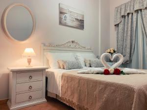 A bed or beds in a room at Vico d'Ercole