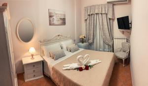 A bed or beds in a room at Vico d'Ercole
