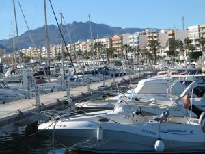 a bunch of boats are docked in a marina at Penthouse Aloha4you in Mojácar