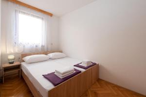 Łóżko lub łóżka w pokoju w obiekcie Apartment Europe with Sea View