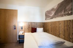 Postel nebo postele na pokoji v ubytování Hotel Bergland Superior