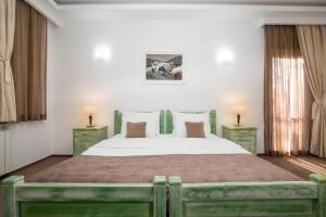 Postel nebo postele na pokoji v ubytování Hotel Trim