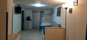 A television and/or entertainment centre at B&B Porta Nuova