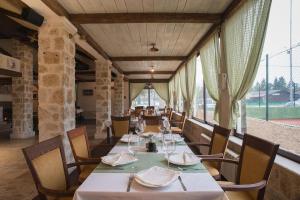 Restoran või mõni muu söögikoht majutusasutuses Hotel Trim