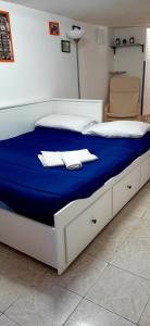 A bed or beds in a room at B&B Porta Nuova