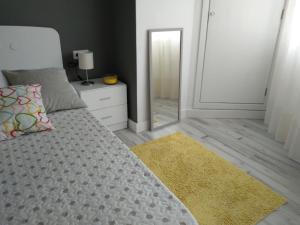 Postel nebo postele na pokoji v ubytování Playa de la Concha