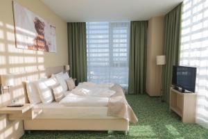 TV a/nebo společenská místnost v ubytování Košice Hotel