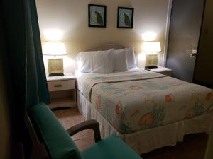 Postel nebo postele na pokoji v ubytování Midtown Guest House