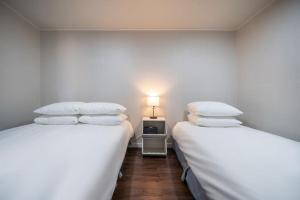 Postel nebo postele na pokoji v ubytování MAYONE HOTEL Myeongdong
