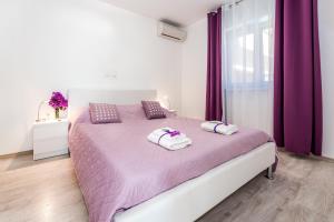 Ένα ή περισσότερα κρεβάτια σε δωμάτιο στο Villa Mirta +43 φωτογραφίες