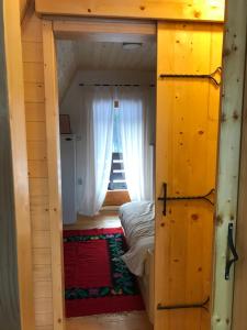 Postel nebo postele na pokoji v ubytování Suncana dolina Tara