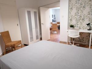 Postel nebo postele na pokoji v ubytování Apartamento cerca de la Ciudad de las Ciencias + 17 fotografií