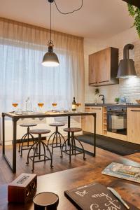 a kitchen with a large table and some chairs at “Forte 99” in Venice in Mestre