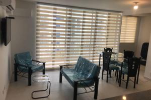 Χώρος καθιστικού στο Apartamento cómodo con todo lo que necesitas con Aire Acondicionado !!