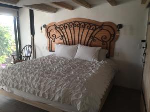 Postel nebo postele na pokoji v ubytování Casa Acento