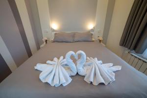 Ένα ή περισσότερα κρεβάτια σε δωμάτιο στο Apartments Slana Oaza