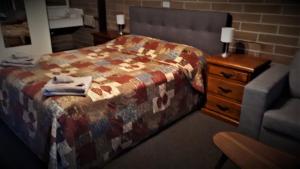 Ένα ή περισσότερα κρεβάτια σε δωμάτιο στο Bordertown Motel +5 φωτογραφίες