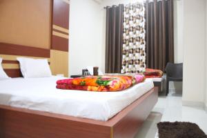 Hotel Shree Hari客房内的一张或多张床位