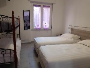 Postel nebo postele na pokoji v ubytování B&B Confine