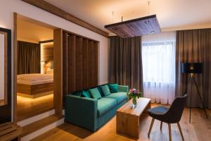 Postel nebo postele na pokoji v ubytování Posthotel Kolberbräu