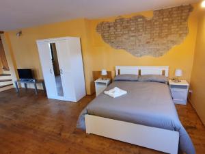 A bed or beds in a room at I Balzani B&B