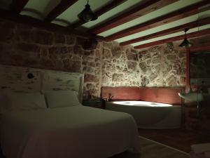 Postel nebo postele na pokoji v ubytování El Racó de Valderrobres