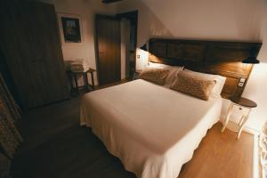 Postel nebo postele na pokoji v ubytování El Racó de Valderrobres