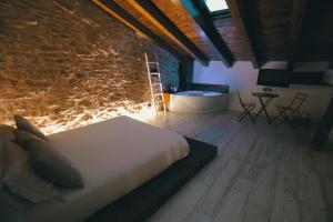 Postel nebo postele na pokoji v ubytování El Racó de Valderrobres