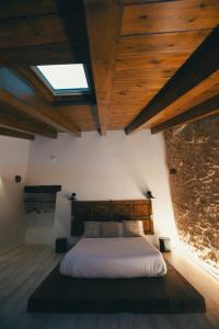 Postel nebo postele na pokoji v ubytování El Racó de Valderrobres