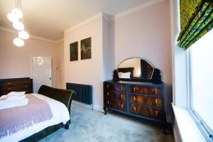 Postel nebo postele na pokoji v ubytování Maison Parfaite HG1 - 2 Luxury apartments with Parking Space - in town centre + 37 fotografií