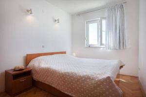 Posteľ alebo postele v izbe v ubytovaní Apartment Matilda