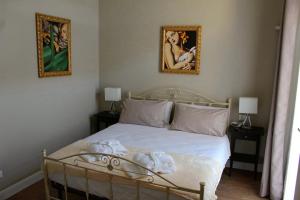 Postel nebo postele na pokoji v ubytování Casa Aydée