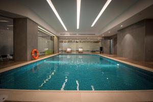 Bazén v ubytování Executives Hotel - Olaya nebo v jeho okolí