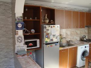 Η κουζίνα ή μικρή κουζίνα στο Chicho Guesthouse