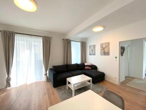 A seating area at White Inn - Ferienwohnung mit Terrasse