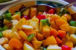 a bowl of fruit with a spoon in it at Sant'Andrea Agriturismo con cantina Martignago Vignaioli Asolo Prosecco Docg Wines in Maser