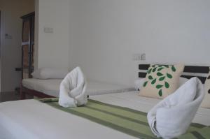 Postel nebo postele na pokoji v ubytování Vallee 69 Eco Villa-Tissa,Yala